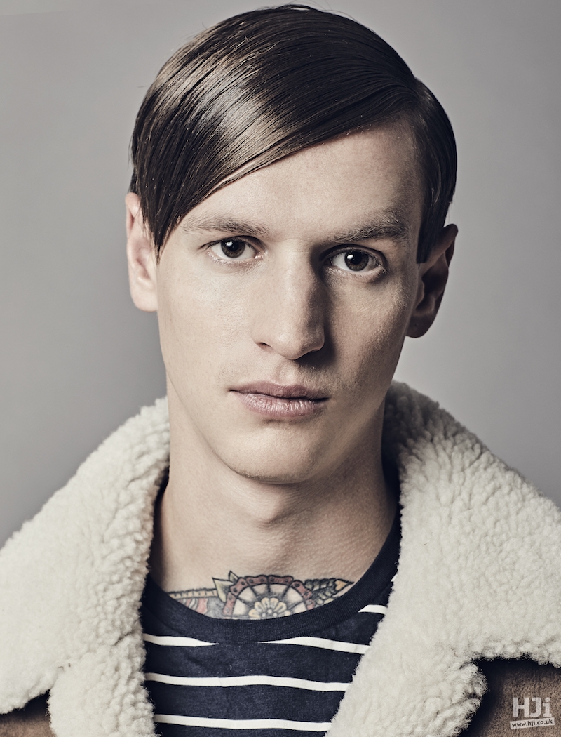 Side parted sweeping fringe mens hairstyle